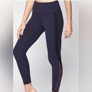 NWOT ATHLETA DARK BLUE WITH BLACK SHEAR ON THE SIDES LEGGINGS SIZE XXS